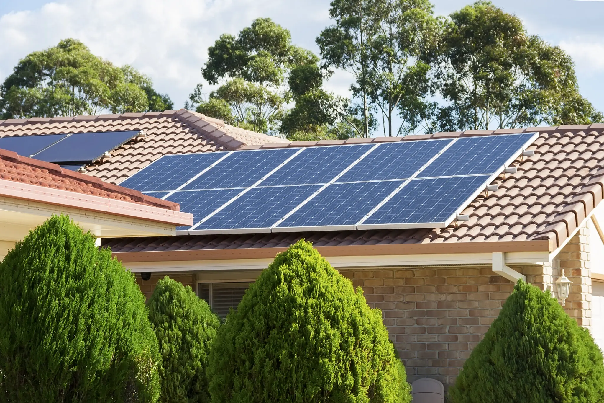 Solar panels on a house roof.