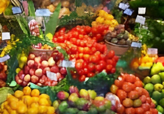 Colorful fruit display with various fruits.