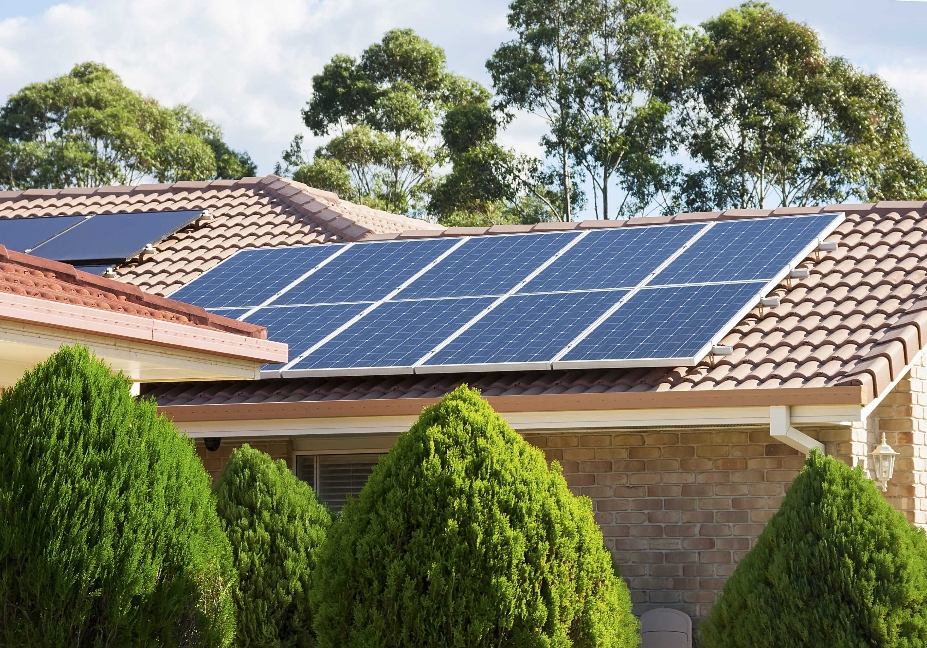 Solar panels on a house roof.